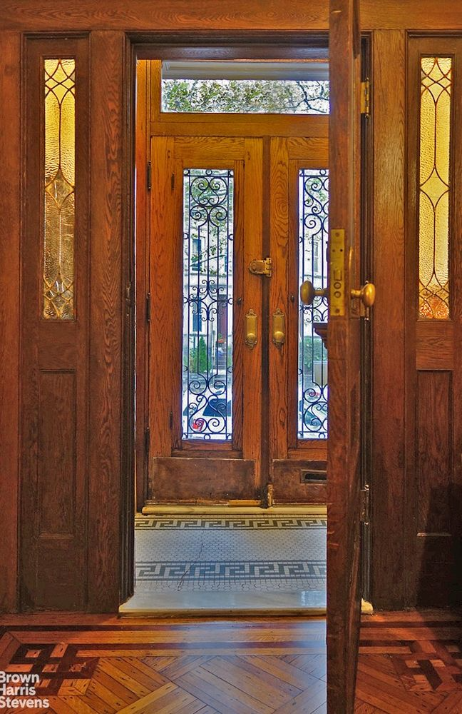 entry with tile in vestibule